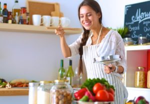 happy-lady-cooking-in-the-kitchen